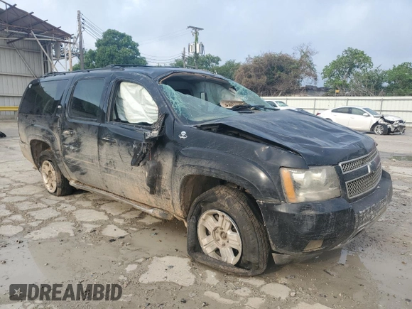 2011 Chevrolet Suburban LT with VIN 1GNSKJE38BR240348, listed as a Copart auction lot 54163335 with 263,030 mi miles and Salvage Title. Bid and sale history available at carsss.com. Image 4.