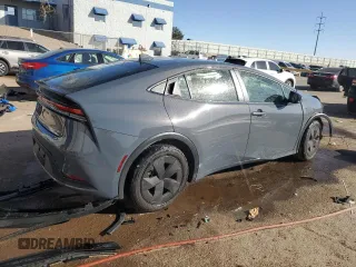 2024 Toyota Prius LE z VIN JTDACAAU2R3028428, wystawiony jako Copart lot #47221845 z przebiegiem Nie podano mil oraz Nie do naprawy • Non repairable. Historia ofert i sprzedaży dostępna na DreamBid. Obrazek 3.