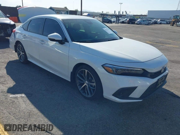 2024 Honda Civic Touring z VIN 2HGFE1F93RH303145, wystawiony jako IAAI lot #41975369 z przebiegiem 32 644 mil mil oraz . Historia ofert i sprzedaży dostępna na DreamBid. Obrazek 1.