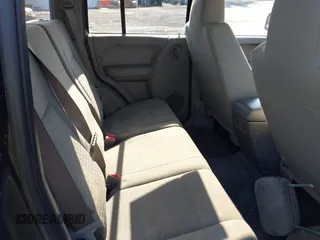 2005 Jeep Liberty Sport with VIN 1J4GL48K85W700799, listed as a IAAI auction lot 42054433 with 166,989 mi miles. Bid and sale history available at carsss.com. Image 8.