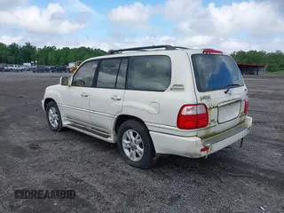 2001 Lexus LX 470 z VIN JTJHT00W613506010, wystawiony jako IAAI lot #42277268 z przebiegiem 186 671 mil mil oraz . Historia ofert i sprzedaży dostępna na DreamBid. Obrazek 3.
