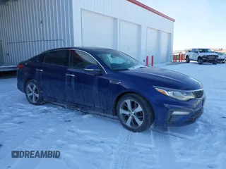 2019 Kia Optima LX with VIN 5XXGT4L33KG317517, listed as a IAAI auction lot 41549578 with 65,657 mi miles and . Bid and sale history available at carsss.com. Image 1.