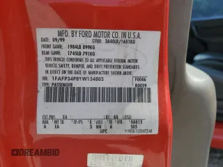 2000 Ford Focus SE z VIN 1FAFP34P8YW134803, wystawiony jako Copart lot #59402265 z przebiegiem 188 652 mil mil oraz Szkoda całkowita • Salvage title. Historia ofert i sprzedaży dostępna na DreamBid. Obrazek 12.