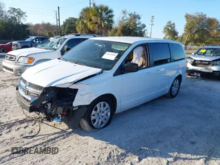 2014 Dodge Grand Caravan SE with VIN 2C4RDGBG1ER220534, listed as a IAAI auction lot 41262990 with 77,851 mi miles and . Bid and sale history available at DreamBid. Image 2.