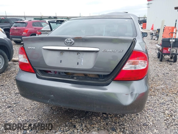 2004 Toyota Camry LE with VIN 4T1BE32K64U868802, listed as a IAAI auction lot 42141061 with 254,215 mi miles. Bid and sale history available at carsss.com. Image 12.