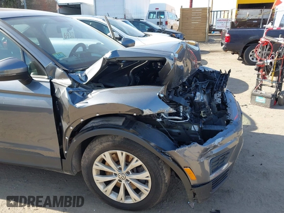 2019 Volkswagen Tiguan S with VIN 3VV0B7AX0KM119702, listed as a IAAI auction lot 42069676 with 69,637 mi miles and . Bid and sale history available at DreamBid. Image 18.