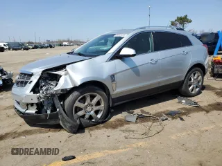 2010 Cadillac SRX Premium Collection z VIN 3GYFNCEY1AS502354, wystawiony jako Copart lot #53603555 z przebiegiem 150 133 mil mil oraz Czysty tytuł • Clean title. Historia ofert i sprzedaży dostępna na DreamBid. Obrazek 1.