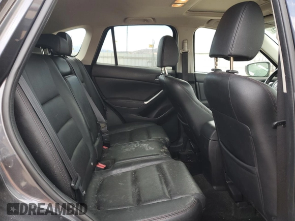 2016 Mazda CX-5 Grand Touring z VIN JM3KE4DY0G0633861, wystawiony jako Copart lot #47748645 z przebiegiem 112 219 mil mil oraz Szkoda całkowita • Salvage title. Historia ofert i sprzedaży dostępna na DreamBid. Obrazek 12.