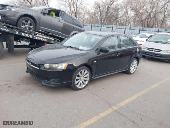 2010 Mitsubishi Lancer GTS with VIN JA32X8HWXAU004111, listed as a IAAI auction lot 41563303 with 198,931 mi miles. Bid and sale history available at carsss.com. Image 2.