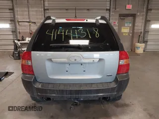 2005 Kia Sportage LX with VIN KNDJE723X57071792, listed as a IAAI auction lot 41441318 with 249,652 mi miles and . Bid and sale history available at carsss.com. Image 17.
