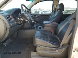 2014 GMC Yukon SLT with VIN 1GKS2CE05ER200523, listed as a Copart auction lot 80029144 with 183,669 mi miles and Salvage Title. Bid and sale history available at DreamBid. Image 7.