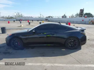 2012 Hyundai Genesis Coupe Grand Touring with VIN KMHHU6KH8CU068486, listed as a IAAI auction lot 41686499 with 104,579 mi miles and . Bid and sale history available at DreamBid. Image 14.