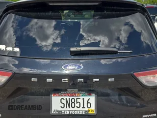 2021 Ford Escape SE with VIN 1FMCU9G6XMUA48017, listed as a IAAI auction lot 42786318 with 107,770 mi miles and . Bid and sale history available at DreamBid. Image 13.
