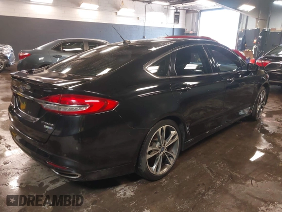 2017 Ford Fusion Titanium with VIN 3FA6P0D93HR197617, listed as a IAAI auction lot 41673022 with 65,041 mi miles and . Bid and sale history available at DreamBid. Image 4.