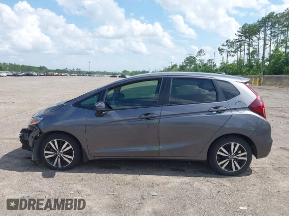2019 Honda Fit EX z VIN 3HGGK5H89KM736677, wystawiony jako IAAI lot #42443401 z przebiegiem 58 559 mil mil oraz . Historia ofert i sprzedaży dostępna na DreamBid. Obrazek 15.