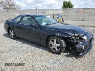 1997 Lexus SC 400 z VIN JT8CH32Y6V1000062, wystawiony jako Copart lot #51287595 z przebiegiem 243 624 mil mil oraz Szkody całkowita. Historia ofert i sprzedaży dostępna na DreamBid. Obrazek 4.