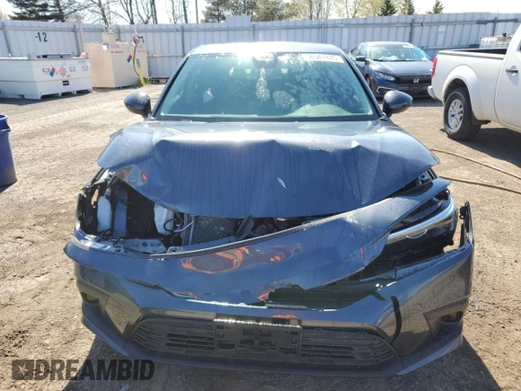 2022 Honda Civic LX z VIN 2HGFE2F26NH131275, wystawiony jako Copart lot #56547825 z przebiegiem 4205 mil mil oraz Czysty tytuł • Clean title. Historia ofert i sprzedaży dostępna na DreamBid. Obrazek 5.
