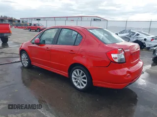 2009 Suzuki SX4 Sport FWD with VIN JS2YC414596200021, listed as a IAAI auction lot 40753192 with 144,805 mi miles and . Bid and sale history available at DreamBid. Image 3.