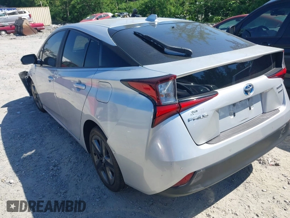 2020 Toyota Prius L Eco z VIN JTDKARFUXL3125434, wystawiony jako IAAI lot #42201623 z przebiegiem 58 609 mil mil oraz . Historia ofert i sprzedaży dostępna na DreamBid. Obrazek 3.