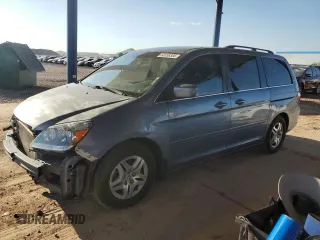 2007 Honda Odyssey EX with VIN 5FNRL38417B064535, listed as a Copart auction lot 62458385 with 208,700 mi miles and Salvage title. Bid and sale history available at DreamBid. Image 1.