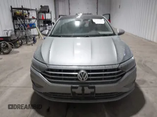 2020 Volkswagen Jetta SEL z VIN 3VWE57BU0LM087350, wystawiony jako IAAI lot #41581637 z przebiegiem 60 528 mil mil oraz . Historia ofert i sprzedaży dostępna na DreamBid. Obrazek 12.