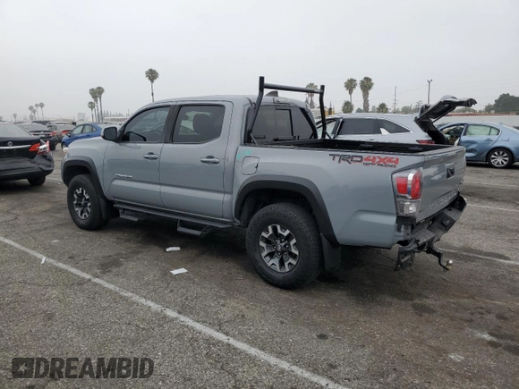 2021 Toyota Tacoma SR with VIN 3TMCZ5AN4MM402889, listed as a Copart auction lot 59942695 with 61,504 mi miles and Salvage title. Bid and sale history available at DreamBid. Image 2.