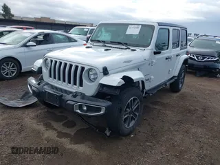 2023 Jeep Wrangler Sahara with VIN 1C4HJXEN7PW701607, listed as a IAAI auction lot 41774580 with 13,376 mi miles. Bid and sale history available at carsss.com. Image 2.
