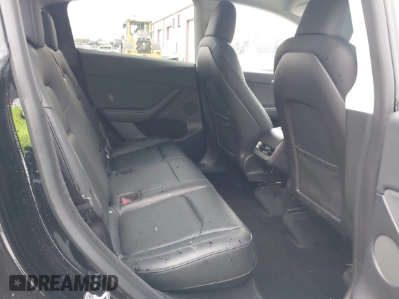 2023 Tesla Model Y Long Range with VIN 7SAYGDEE2PA024032, listed as a IAAI auction lot 41213403 with 23,418 mi miles and . Bid and sale history available at DreamBid. Image 8.