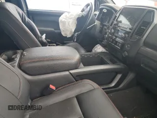 2021 Nissan Titan Pro-4X with VIN 1N6AA1ED0MN528002, listed as a Copart auction lot 54779885 with 33,235 mi miles and Salvage title. Bid and sale history available at DreamBid. Image 7.