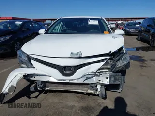 2019 Toyota Camry LE with VIN 4T1B11HK3KU772369, listed as a IAAI auction lot 41353103 with 85,565 mi miles and . Bid and sale history available at DreamBid. Image 11.