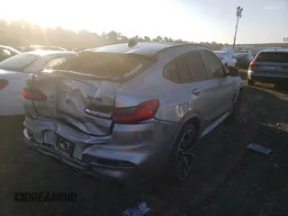 2021 BMW X4 M z VIN 5YMUJ0C00M9F77102, wystawiony jako Copart lot #59472373 z przebiegiem 5041 mil mil oraz . Historia ofert i sprzedaży dostępna na DreamBid. Obrazek 4.