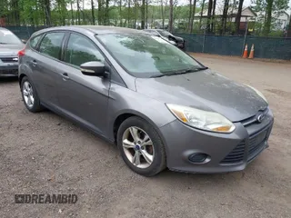 2014 Ford Focus SE with VIN 1FADP3K28EL280100, listed as a IAAI auction lot 42081971 with 183,379 mi miles. Bid and sale history available at carsss.com. Image 1.