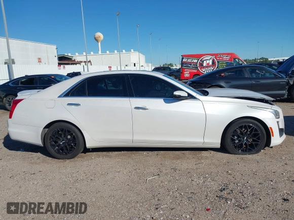 2019 Cadillac CTS RWD with VIN 1G6AP5SX0K0121219, listed as a IAAI auction lot 41239899 with 84,588 mi miles and . Bid and sale history available at DreamBid. Image 13.