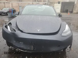 2023 Tesla Model Y Long Range with VIN 7SAYGDEE8PF895293, listed as a Copart auction lot 44208615 with 16,549 mi miles and Salvage Title. Bid and sale history available at DreamBid. Image 5.