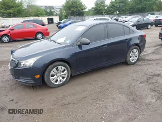 2014 Chevrolet Cruze LS with VIN 1G1PA5SG3E7319385, listed as a IAAI auction lot 42264380 with 124,525 mi miles and . Bid and sale history available at DreamBid. Image 2.