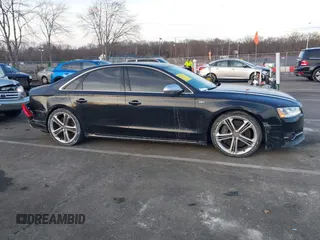2015 Audi S8 with VIN WAUK2AFD5FN027013, listed as a IAAI auction lot 41456289 with 77,877 mi miles. Bid and sale history available at carsss.com. Image 13.