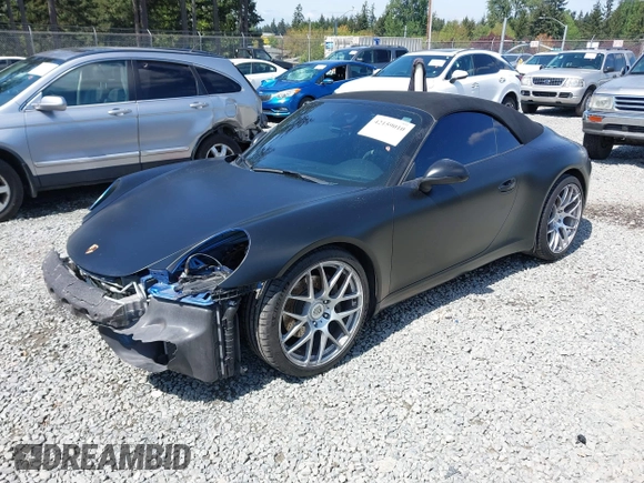 2014 Porsche 911 Carrera z VIN WP0CA2A94ES140857, wystawiony jako IAAI lot #42159010 z przebiegiem 46 230 mil mil oraz . Historia ofert i sprzedaży dostępna na DreamBid. Obrazek 19.