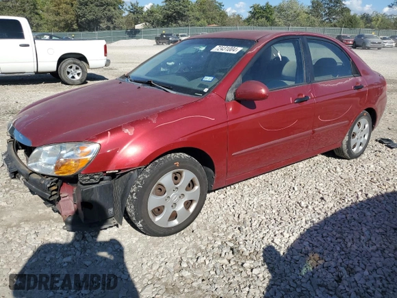 2009 Kia Spectra EX with VIN KNAFE221595630820, listed as a Copart auction lot 72431004 with 136,469 mi miles and Salvage Title. Bid and sale history available at carsss.com. Image 1.