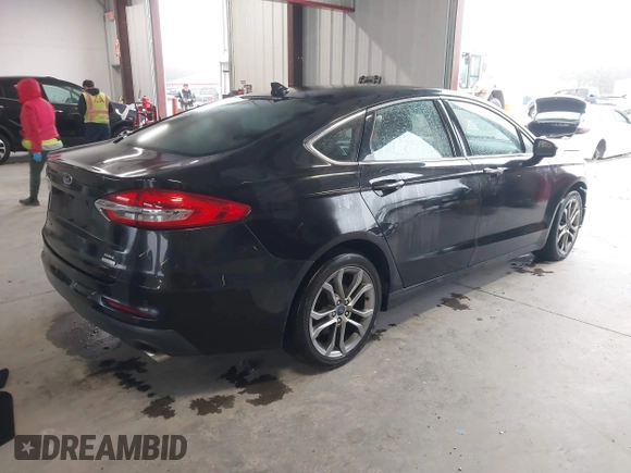 2019 Ford Fusion SEL with VIN 3FA6P0CD2KR260770, listed as a IAAI auction lot 41564261 with 108,818 mi miles and . Bid and sale history available at DreamBid. Image 4.