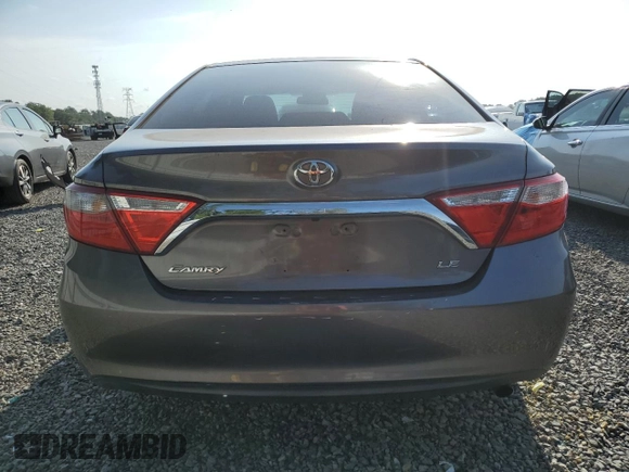 2015 Toyota Camry XLE with VIN 4T1BF1FKXFU899517, listed as a Copart auction lot 56001835 with 124,675 mi miles and Salvage Title. Bid and sale history available at DreamBid. Image 6.