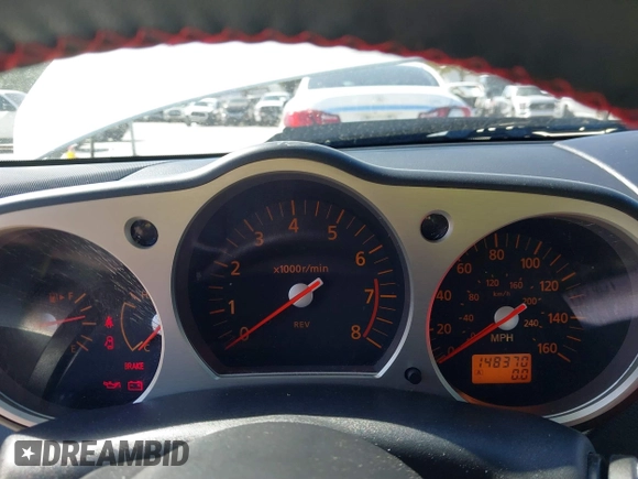 2004 Nissan 350Z Touring with VIN JN1AZ34E74T064156, listed as a IAAI auction lot 41498213 with 148,370 mi miles. Bid and sale history available at carsss.com. Image 7.