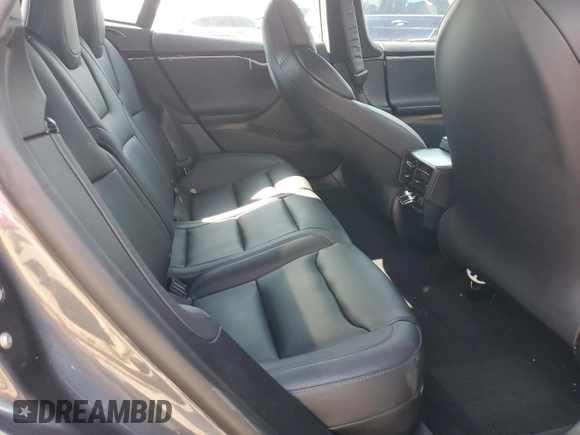 2019 Tesla Model S 100D с VIN 5YJSA1E42KF312803, выставлен на аукционе Copart как лот 71246484 с пробегом 89 820 миль миль и На запчасти • Non repairable. История ставок и продаж доступна на DreamBid. Изображение 10.