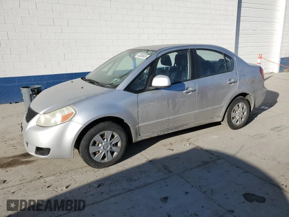 2010 Suzuki SX4 LE with VIN JS2YC5A27A6300498, listed as a Copart auction lot 43036655 with 237,647 mi miles and Salvage Title. Bid and sale history available at carsss.com. Image 1.