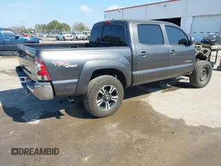2010 Toyota Tacoma PreRunner with VIN 3TMJU4GNXAM099667, listed as a IAAI auction lot 41530993 with 201,375 mi miles and . Bid and sale history available at DreamBid. Image 4.