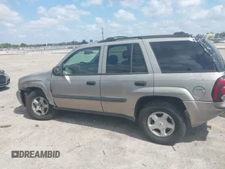 2003 Chevrolet TrailBlazer LS with VIN 1GNDT13SX32367807, listed as a IAAI auction lot 42070031 with 162,966 mi miles and . Bid and sale history available at DreamBid. Image 14.