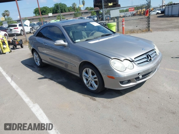 2007 Mercedes-Benz CLK-Class 3.5L with VIN WDBTJ56H47F215889, listed as a IAAI auction lot 42109563 with 106,593 mi miles. Bid and sale history available at carsss.com. Image 1.