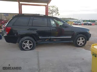 2005 Jeep Grand Cherokee Laredo with VIN 1J4HR48N75C647740, listed as a IAAI auction lot 41803160 with 145,147 mi miles. Bid and sale history available at carsss.com. Image 13.