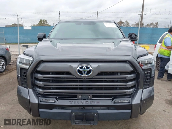 2023 Toyota Tundra Limited Hybrid with VIN 5TFJC5DB7PX021014, listed as a IAAI auction lot 42067753 with 64,991 mi miles and . Bid and sale history available at DreamBid. Image 12.