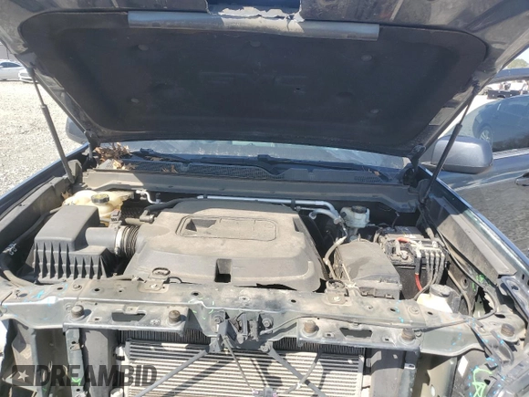 2015 GMC Canyon 4WD SLE with VIN 1GTG6BE35F1139586, listed as a Copart auction lot 48249655 with 168,547 mi miles and Salvage Title. Bid and sale history available at carsss.com. Image 12.
