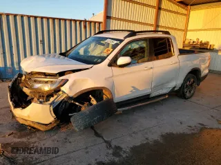 2017 Honda Ridgeline RTL z VIN 5FPYK3F57HB007386, wystawiony jako Copart lot #82328364 z przebiegiem Nie podano mil oraz Szkoda całkowita • Salvage title. Historia ofert i sprzedaży dostępna na DreamBid. Obrazek 1.